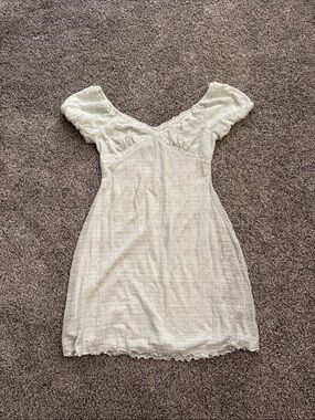 Ice blue Mini Dress with Puff Sleeves and lining.
